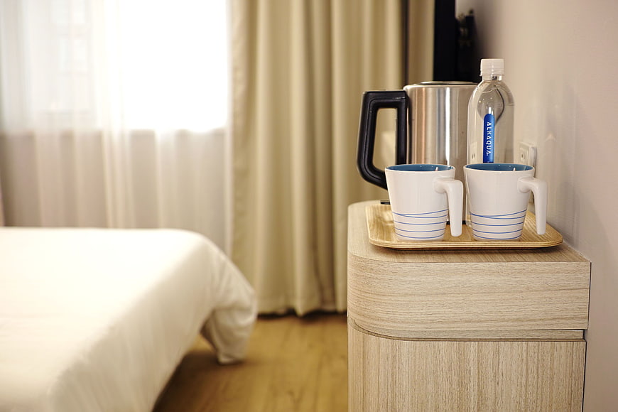 Hotel Room Coffee Station with Kettle and Mugs