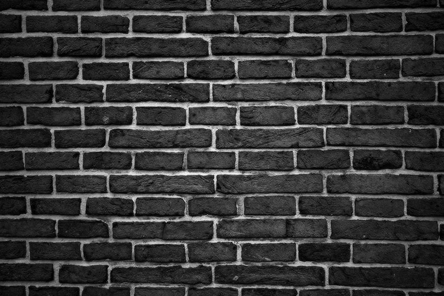 Dark Black Brick Wall Texture Background