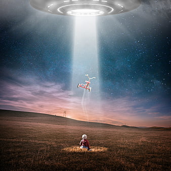 Child in field watching UFO beam lift tricycle at night
