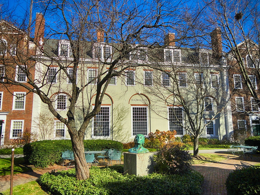 Harvard Business School Campus Building With Sculpture And Trees
