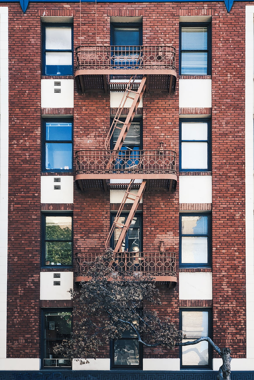 Red Brick Apartment Building with Fire Escape