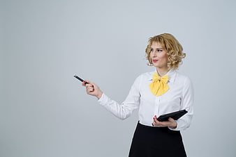 Professional Business Woman Pointing with Pen and Tablet