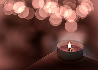 Tealight Candle with Bokeh Background