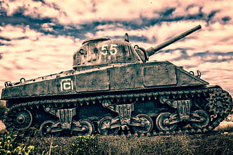 Weathered WWII Military Tank Memorial in Normandy