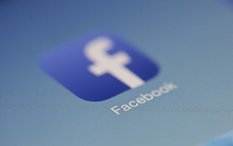 Close-up of Facebook Logo on Digital Screen