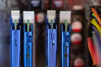 Close-up of Blue RAM Slots on Computer Motherboard