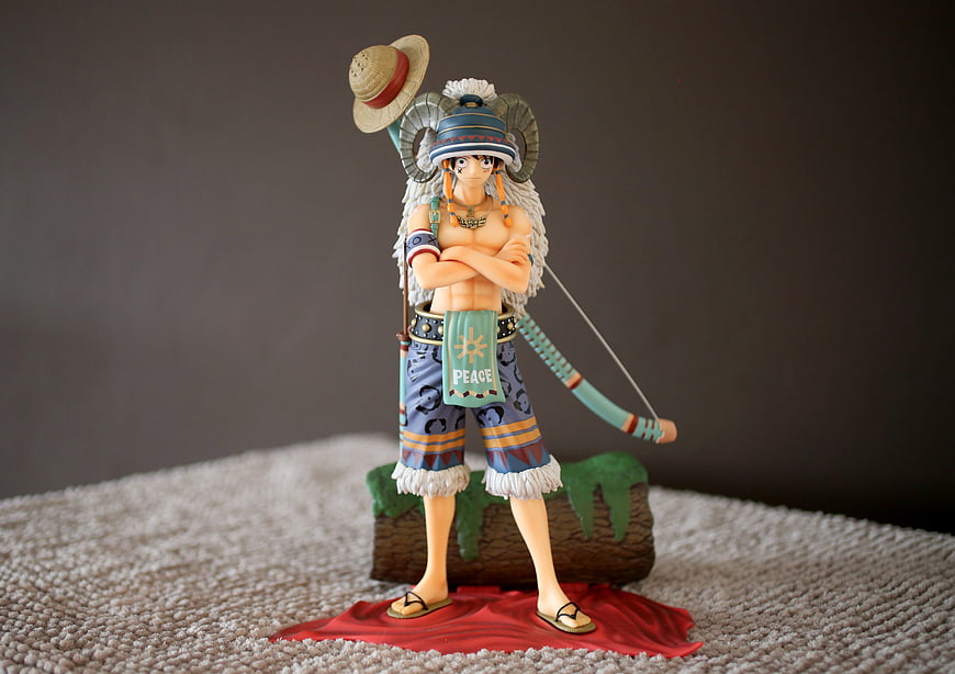 One Piece Luffy Sun God Nika Figure on Carpet
