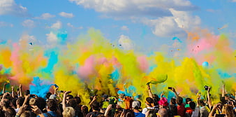 Colorful Holi Festival Crowd with Powder in the Air