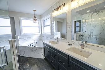 Modern Luxury Bathroom Interior With Marble Vanity And Soaking Tub