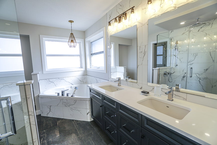 Modern Luxury Bathroom Interior With Marble Vanity And Soaking Tub