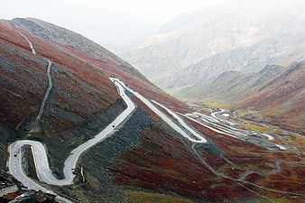 Winding mountain highway through Babusar Pass in autumn