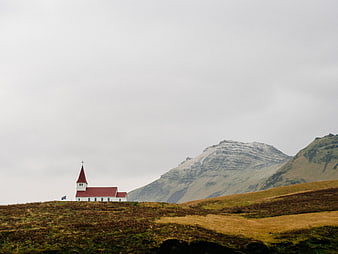 White Church with Red Roof in Icelandic Landscape