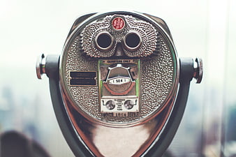 Close-up of vintage coin-operated tower viewer binoculars