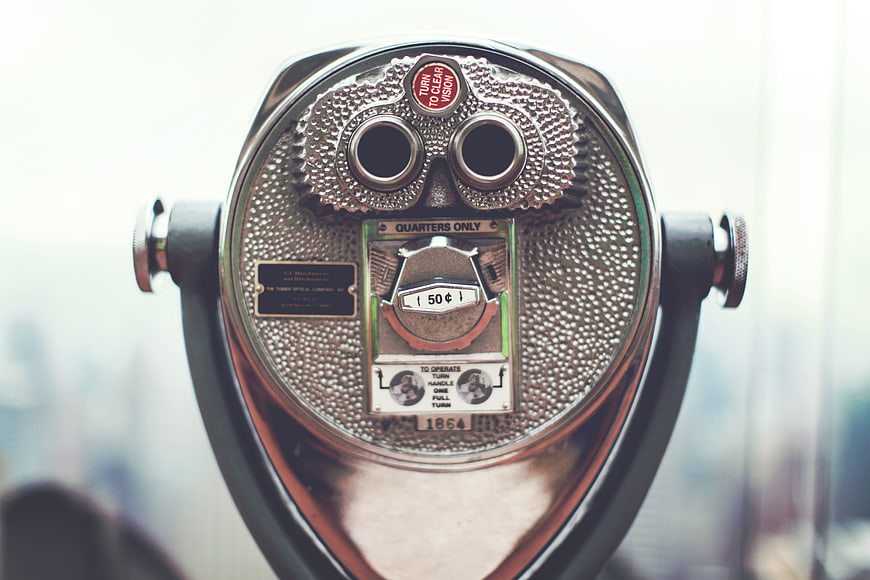 Close-up of vintage coin-operated tower viewer binoculars