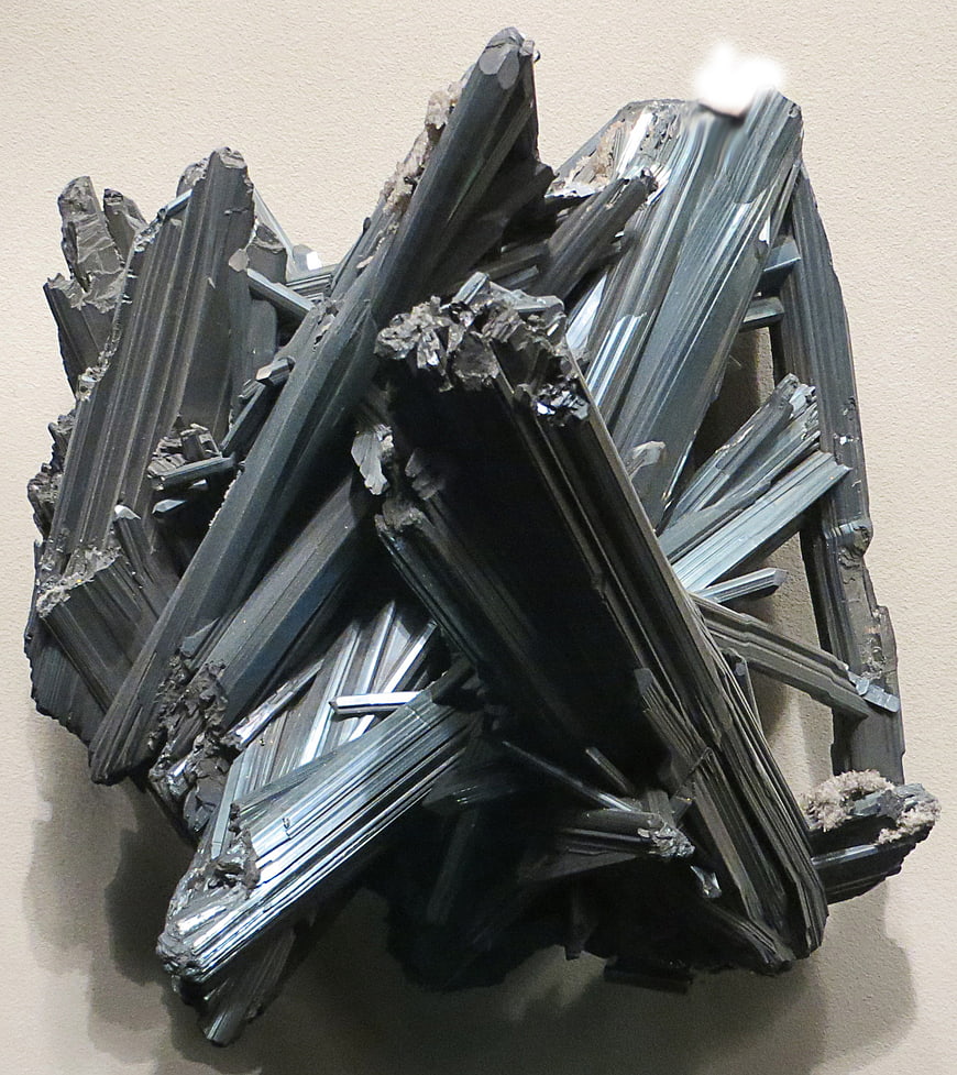 Close-up of dark metallic mineral crystal cluster