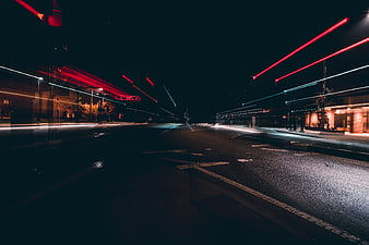 Long Exposure Night City Street with Red Light Trails