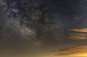 Milky Way Galaxy Night Sky with Clouds and Stars