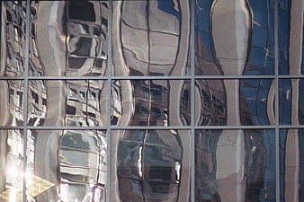Abstract distorted building reflection on glass facade