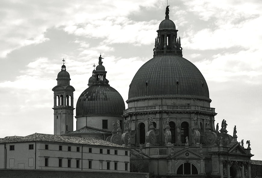 Black and white architecture of a Venetian basilica with domes