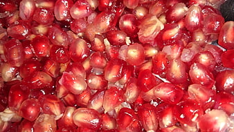 Close-up of fresh red pomegranate seeds