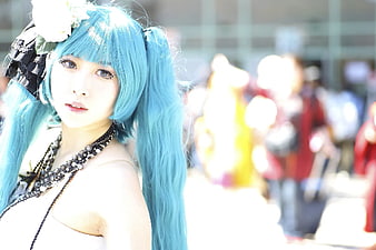Blue-haired Cosplayer Portrait with Flower Headpiece