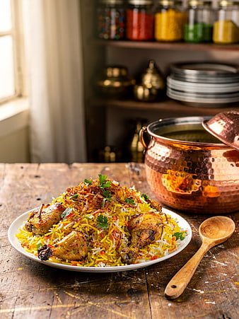 Delicious Chicken Biryani on Rustic Wooden Table