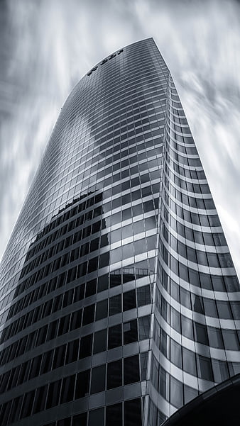 Low Angle View of Modern Glass Skyscraper