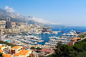 Aerial View of Monaco Harbor with Yachts and Cityscape