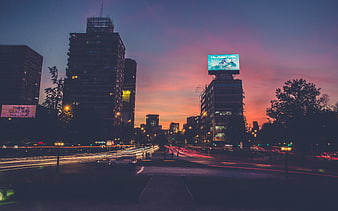 Long Exposure City Traffic at Dusk with Colorful Sky