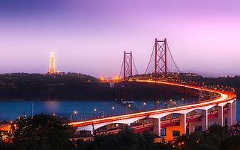 Lisbon 25 de Abril Bridge and Christ the King at Dusk