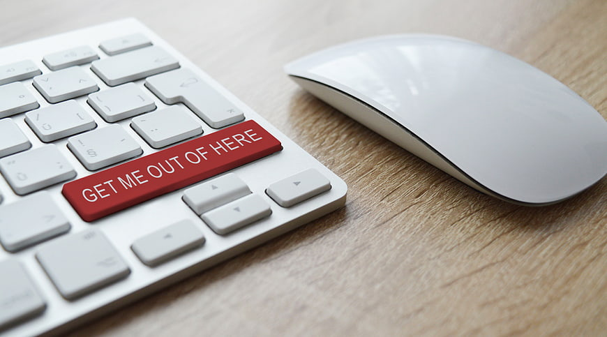 White Keyboard with Red 'Get Me Out of Here' Key