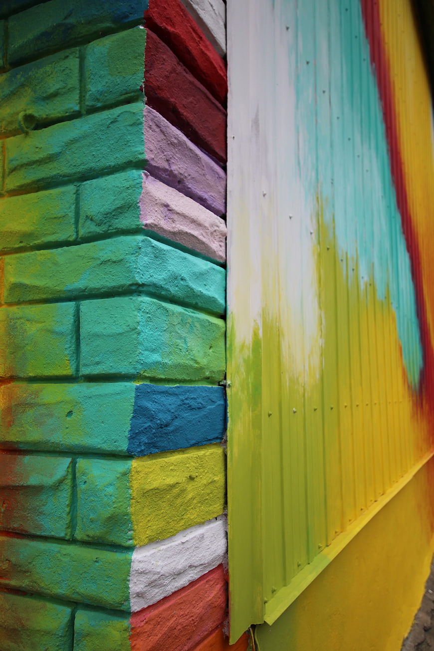 Vibrant Multicolored Brick Wall Corner Detail