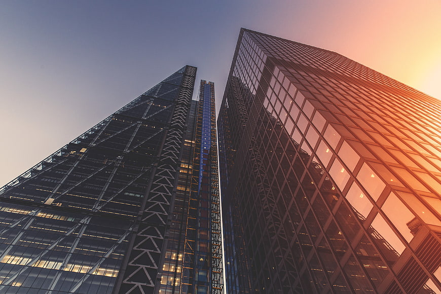 Low Angle View of Modern Glass Skyscrapers at Sunset