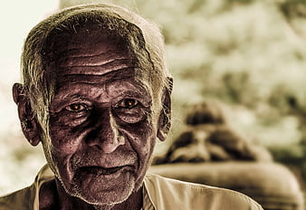 Close-up Portrait of Elderly Man with Weathered Face