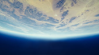Earth curvature from space with clouds and ocean