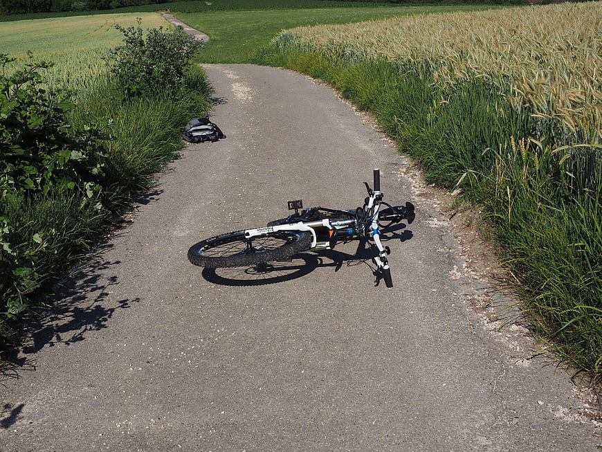 Overturned Mountain Bike On Rural Gravel Path