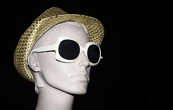 White Mannequin Head with Gold Hat and Sunglasses