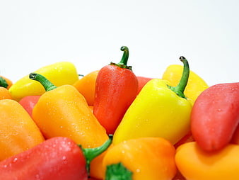 Fresh Colorful Bell Peppers with Water Droplets on White Background