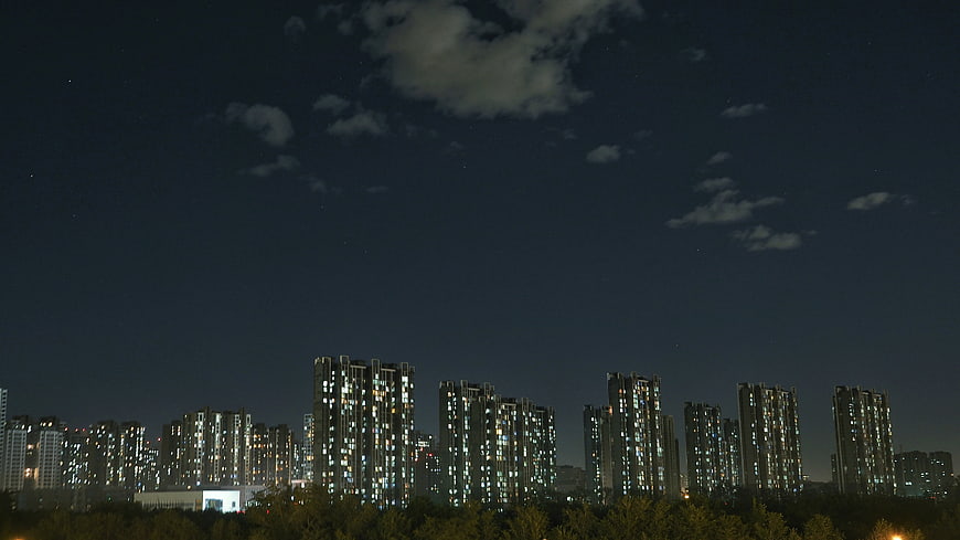 Night Sky Over City Apartment Complex