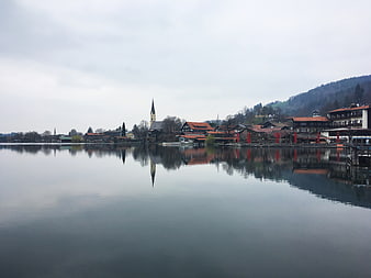 Serene Lake Bled Reflection with Church Spire and Village
