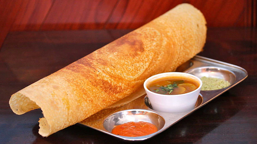 Crispy Indian Dosa with Sambar and Chutney on Metal Tray