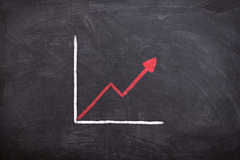 Red Chalk Growth Arrow On Blackboard