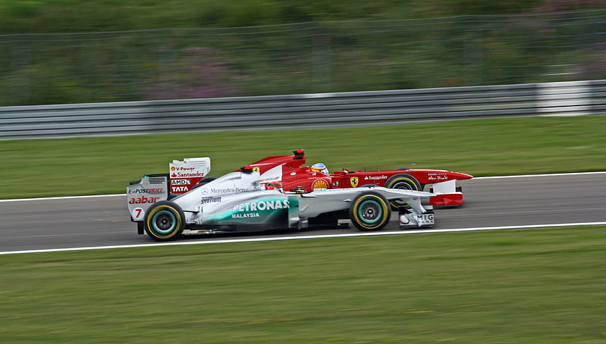 Formula 1 Race Cars Overtaking on Track