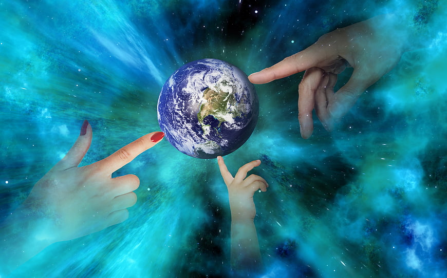 Hands Reaching Toward Earth Globe in Cosmic Nebula Background