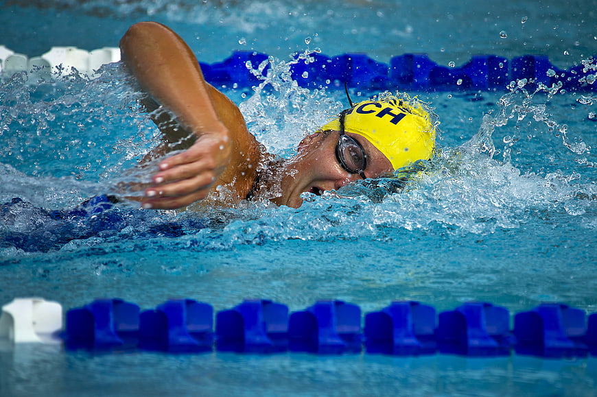 Female Swimmer in Action During Pool Competition