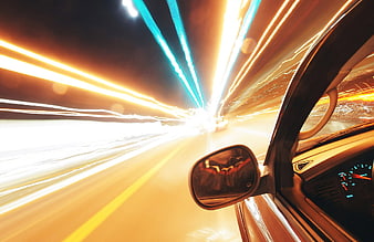 Night driving car speed light trails motion blur