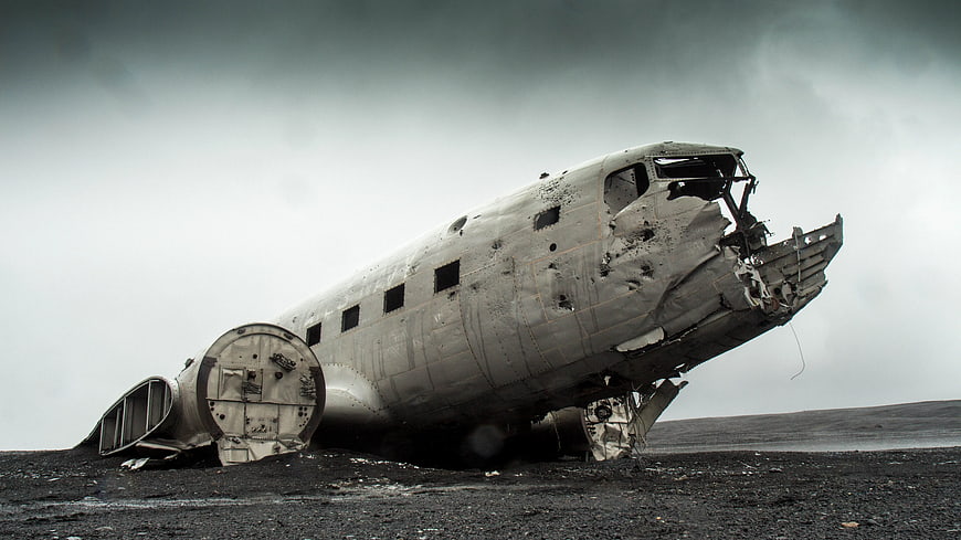 Wrecked DC-3 airplane on black sand beach Iceland
