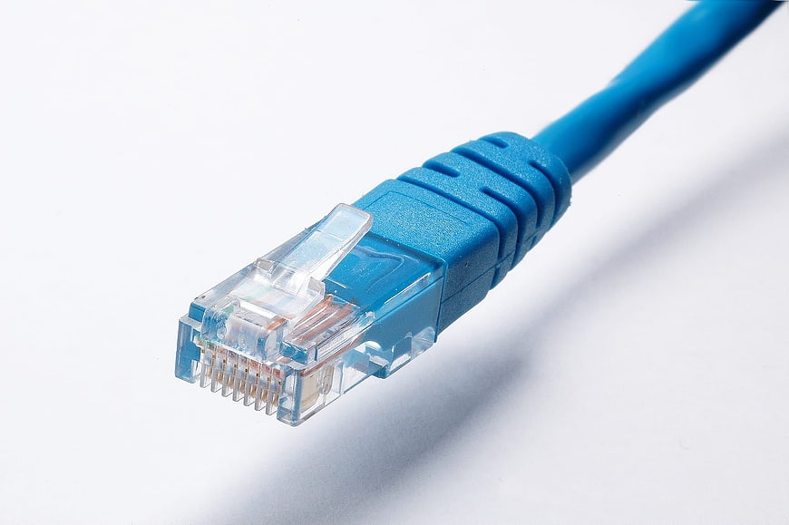 Blue Ethernet Cable Connector on White Background