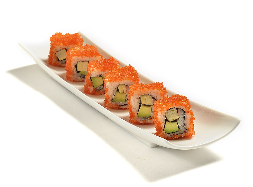 California Sushi Rolls With Salmon Roe On White Plate