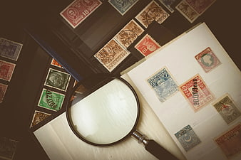 Vintage Stamp Collection with Magnifying Glass